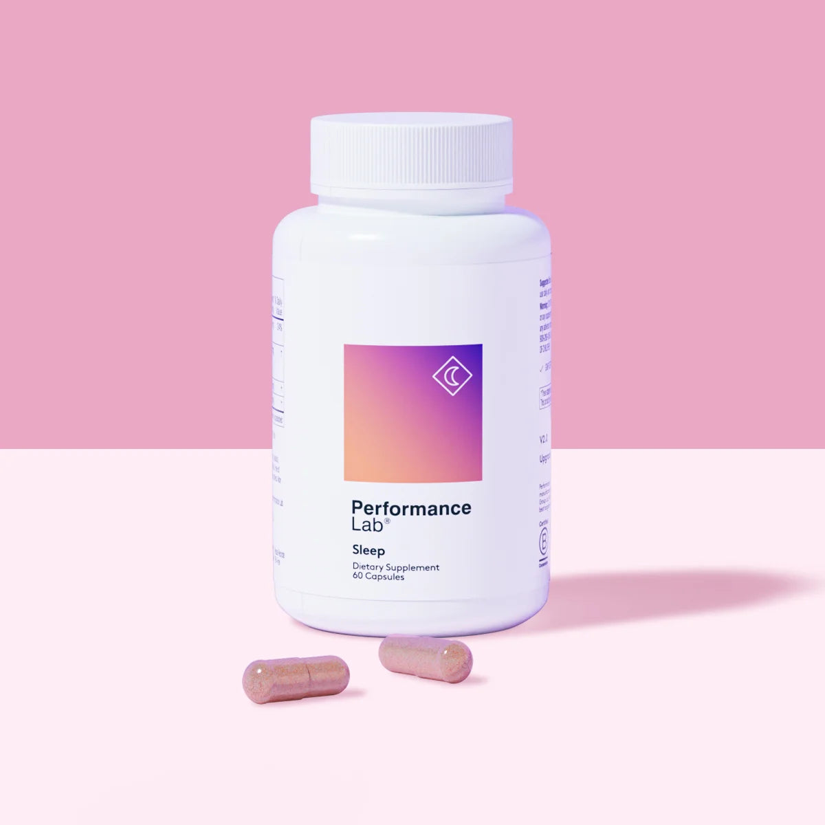 Performance Lab Sleep supplement bottle with two capsules.