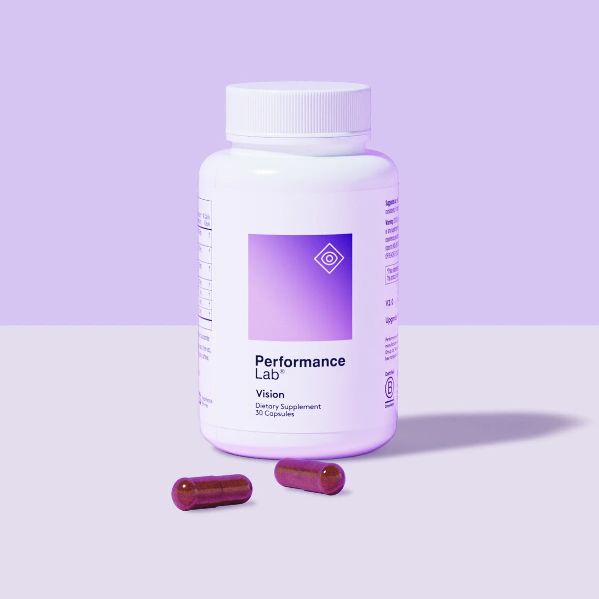 Performance Lab Vision supplement bottle with two capsules.