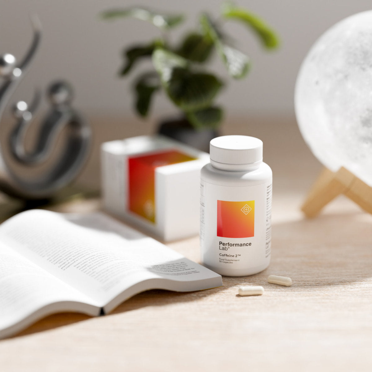 image of Caffeine 2™ bottle sitting on a table