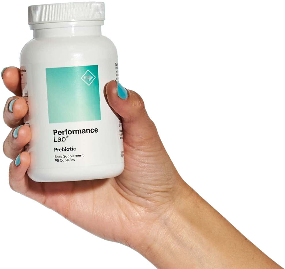 image of hand holding Prebiotic bottle